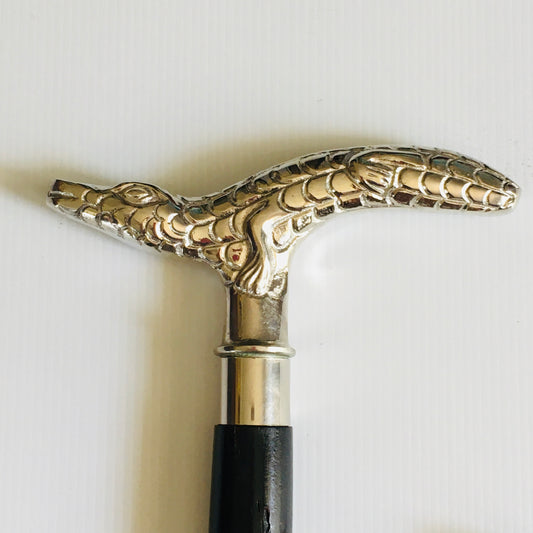 Walking Stick with comfortable Silver Crocodile Handle on a black stick