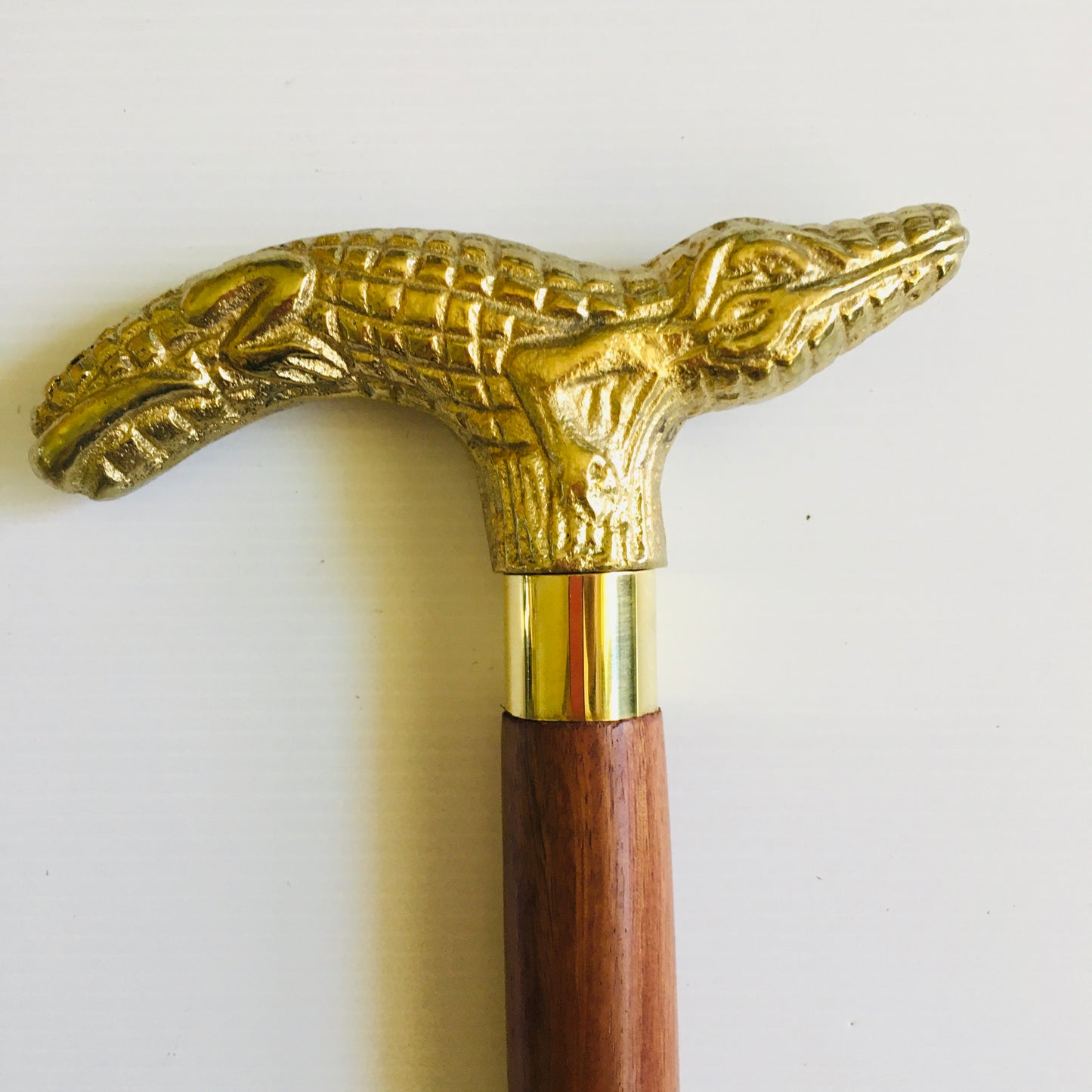 Walking Stick with Brass color on an Alloy Crocodile handle with brown inlaid stick