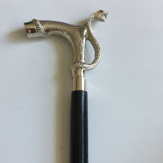 Walking Stick with Silver Snakes Head Handle on a black stick